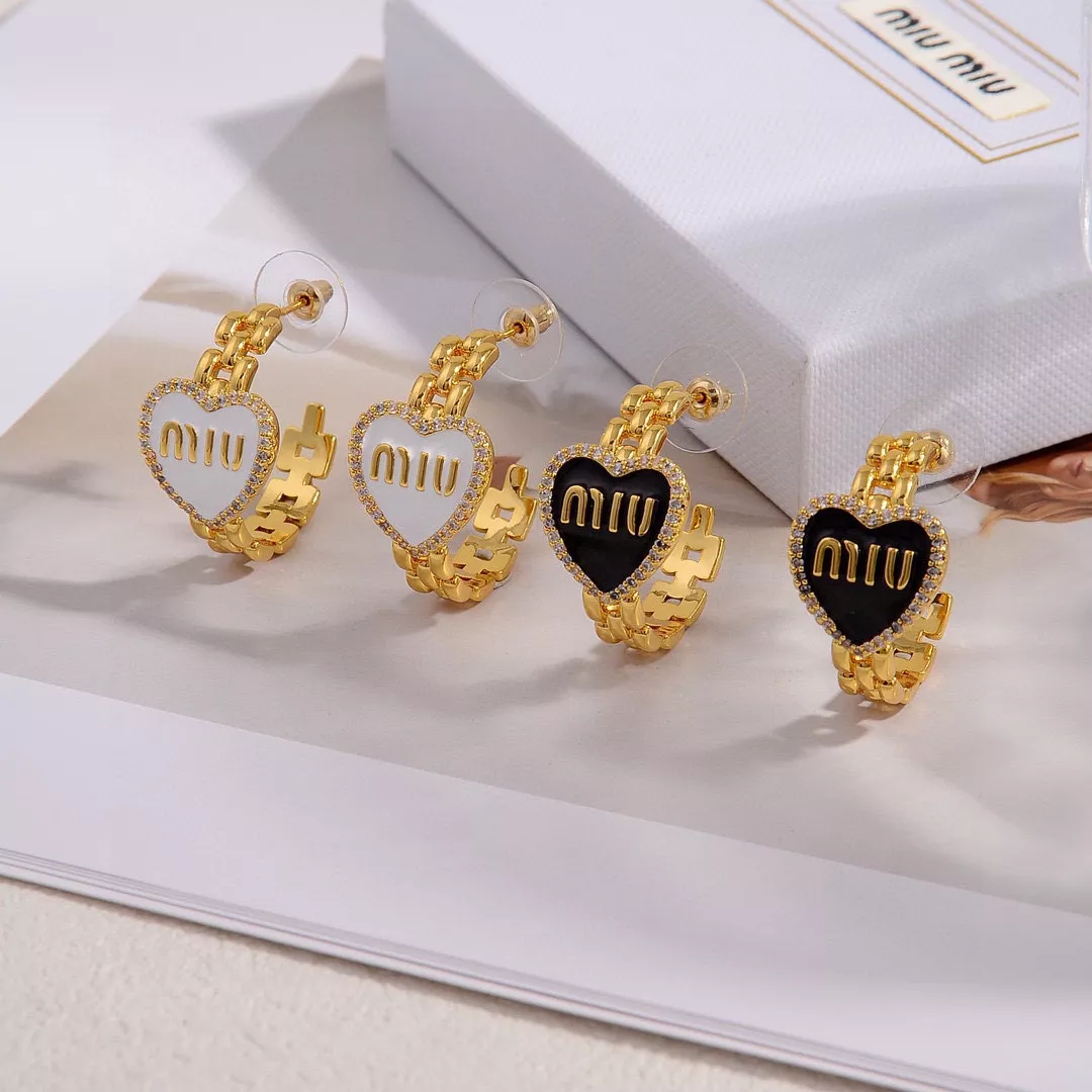 miu miu boucles doreilles pour femme s_12706a22